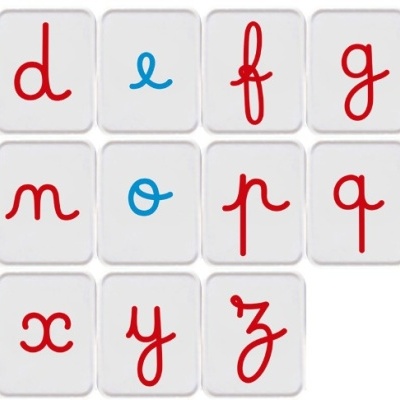 Alphabet tiles with red and blue cursive lowercase letters