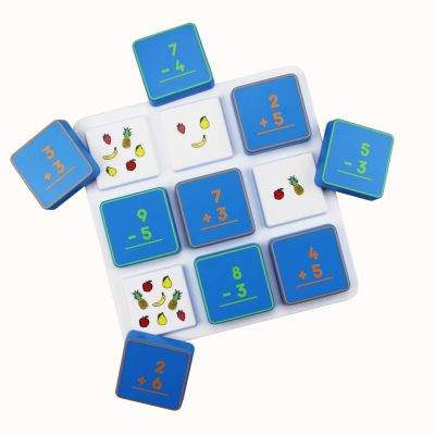 Educational math and fruit matching game tiles on a white base