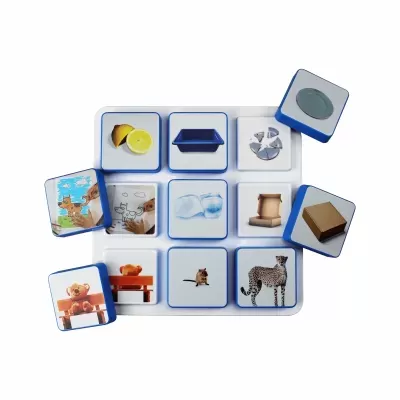 Blue-edged square tiles with various images on a white tray, some tiles are outside the tray