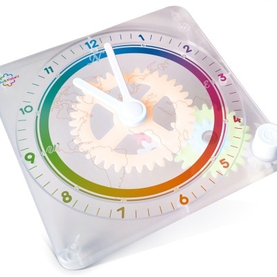 Transparent educational plastic clock with colorful dial and visible gears