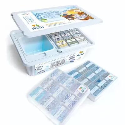 White box with tiles labeled Super Mind containing decorative patterned tiles and cases with more tiles