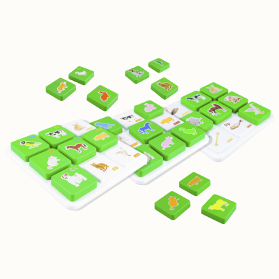 Green and white educational tiles with animals on white boards