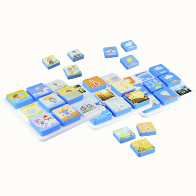 Childrens weather educational game with colorful weather and season tiles on white trays