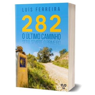 Capa do livro mostrando um caminho rural e uma placa com concha amarela