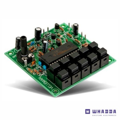 Placa eletrónica verde com componentes e botões pretos