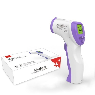 Termómetro infravermelho branco e lilás com ecrã digital verde ao lado da sua embalagem branca
