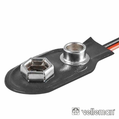 Suporte preto com cabo e inserções metálicas, texto 'velleman'