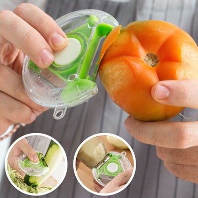 Descascador verde transparente a descascar tomate e legumes