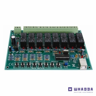 Placa eletrónica verde com múltiplos relés e componentes electrónicos