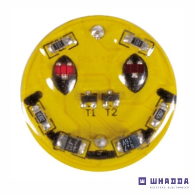 Placa eletrónica circular amarela com componentes eletrónicos