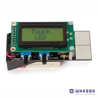 Dispositivo eletrónico com ecrã LCD verde a mostrar 'Touch LED'