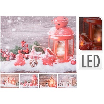 Lanterna vermelha LED com decoração natalícia e neve artificial sobre mesa