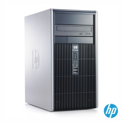 Computador de secretária HP Compaq cinzento e preto com entradas e logótipos visíveis