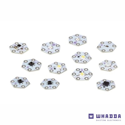 Circuitos eletrónicos hexagonais brancos com componentes eletrónicos sobre fundo branco com logo WHADDA