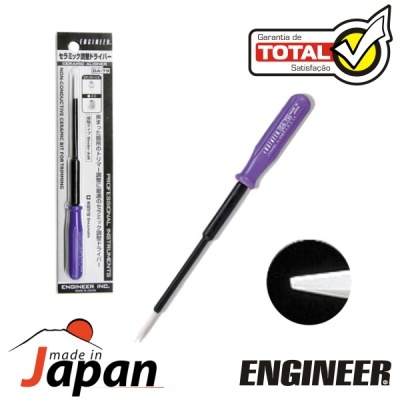 Chave de precisão com cabo roxo e haste preta em embalagem plástica