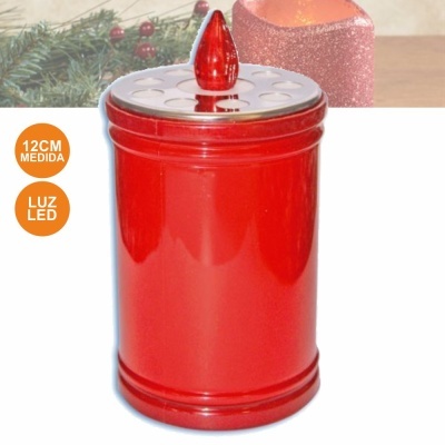 Recipiente vermelho cilíndrico com tampa cinza e luz LED, em fundo com vela rosa e decoração de Natal