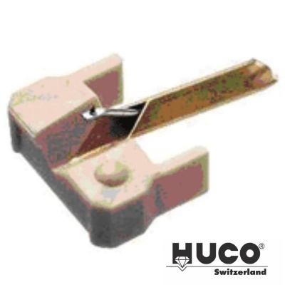 Peça metálica pequena dourada com base bege e logo HUCO Switzerland