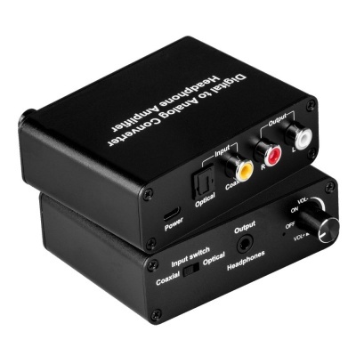 Conversor digital para analógico preto com entradas RCA e botão de volume.