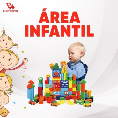 Criança a brincar com blocos de construção coloridos em área infantil com texto ÁREA INFANTIL