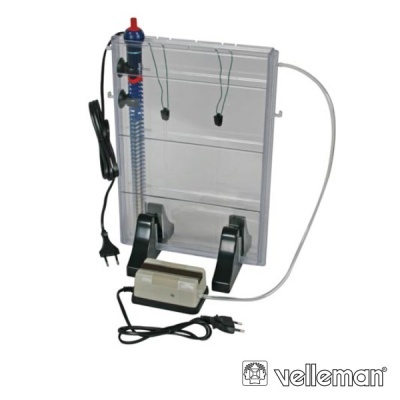Aparelho experimental de eletricidade com componentes transparentes, pretos e fios, com ficha europeia e etiqueta velleman.