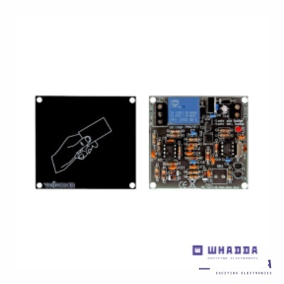 dois módulos eletrónicos quadrados, um com desenho de mão e cartão, outro com componentes eletrónicos e logo WHADDA