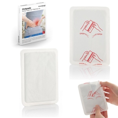 Almofadas térmicas Hotpads brancas para alívio da dor com embalagem e instruções de uso