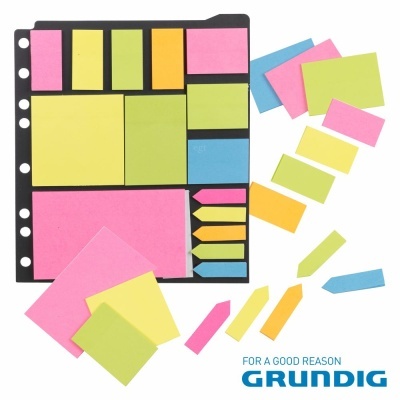 Conjunto de notas adesivas coloridas num suporte preto com logótipo GRUNDIG