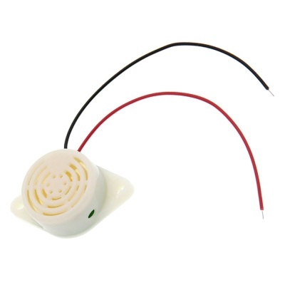 Componente eletrónico branco com fios preto e vermelho