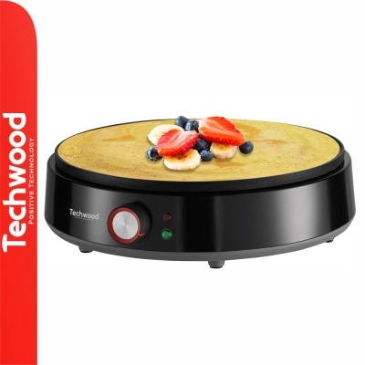 Crepeira eléctrica preta Techwood com crepe e frutos no topo