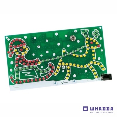 Placa eletrónica com design de Natal e LEDs coloridos