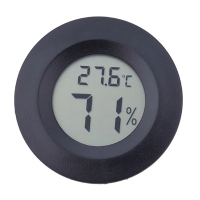 Termómetro e higrómetro digital redondo com display a mostrar 27.6°C e 71%