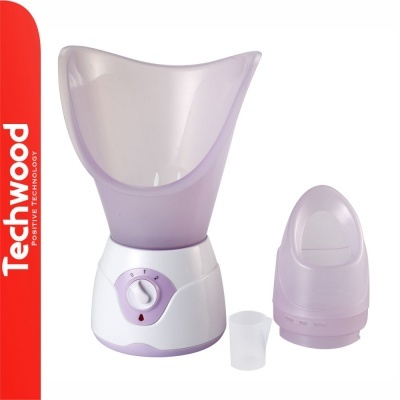 Aparelho de sauna facial branco com detalhes lilás e acessórios