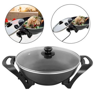 Frigideira elétrica preta com tampa de vidro e pega em ambos os lados