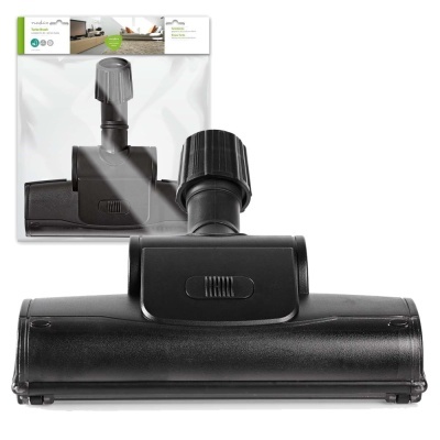 Cabeça de aspirador de pó preta na embalagem transparente com folha branca e verde