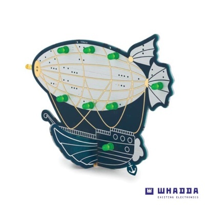 Relógio divertido em forma de dirigível com pinos verdes