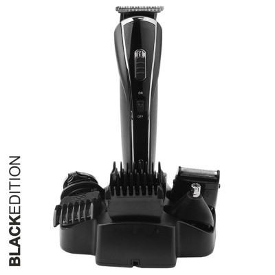 Aparelho de tosquiar preto com base e acessórios