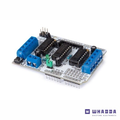 Placa eletrónica branca com componentes azuis e pretos e texto WHADDA EXCITING ELECTRONICS