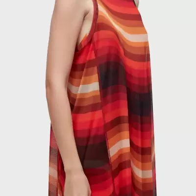 Vestido transparente com padrão ondulado em tons quentes