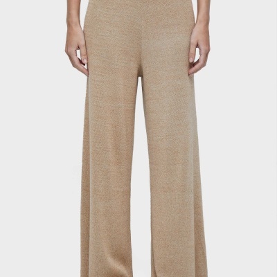 Calças largas bege de malha com cós alto e elástico