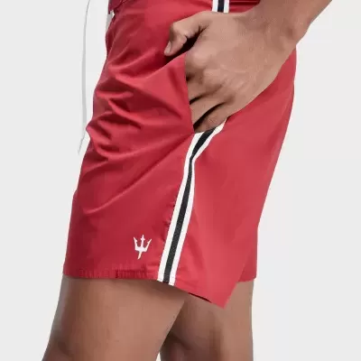 Calções vermelhos com risca lateral e logótipo de tridente