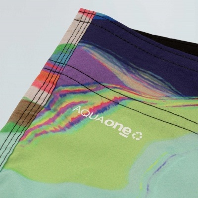 Tecido colorido com padrão abstrato e texto AQUAone