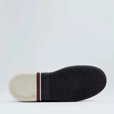 Sola de sapato bicolor preta e branca com faixa bordô