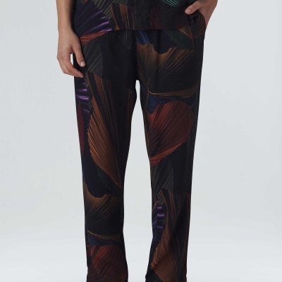 Calças compridas com padrão abstrato em várias cores