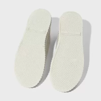 Solas de sapatos brancas com textura