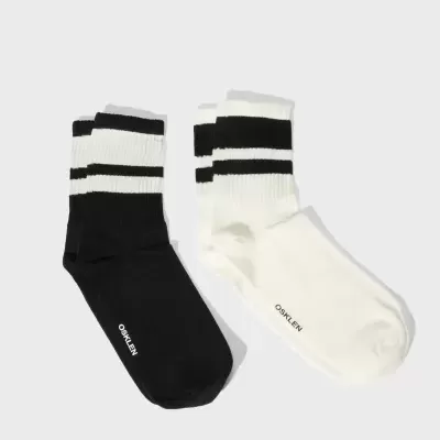 Par de meias preto e branco com riscas e escrita ORKLEN