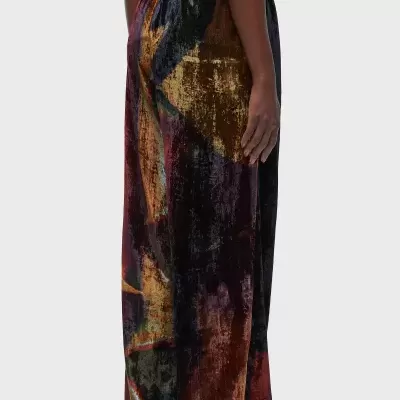 Calças largas de veludo com padrão abstrato em várias cores