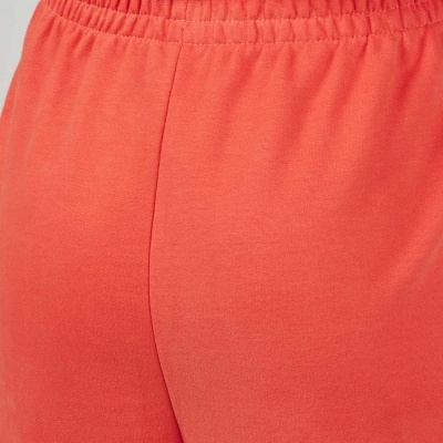 Calças desportivas coral com cós elástico franzido