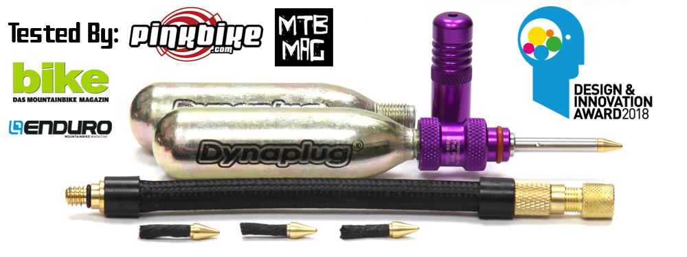 Kit de bomba de bicicleta Dynaplug com acessórios e vários logotipos de marcas e prémios