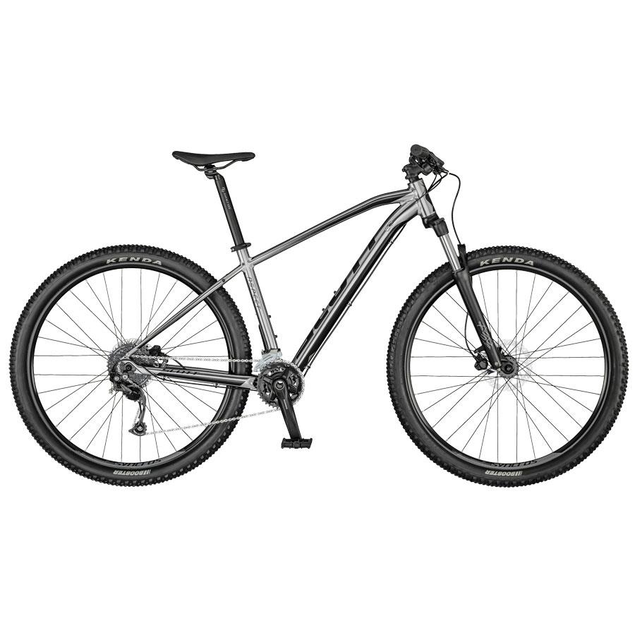 Bicicleta de montanha cinza e preto com pneus Kenda