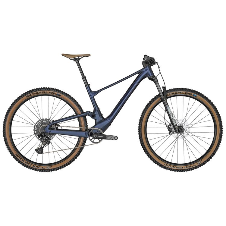 Bicicleta de montanha azul escura com pneus marrons Schwalbe vista lateral